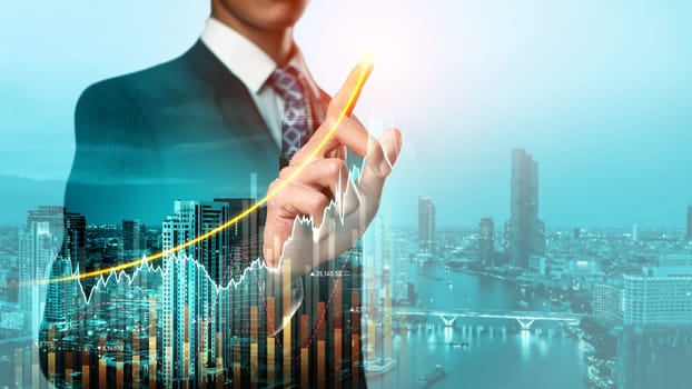 Businessman analyst working with digital finance business data graph showing technology of investment strategy for perceptive financial business decision. Digital economic analysis technology concept.