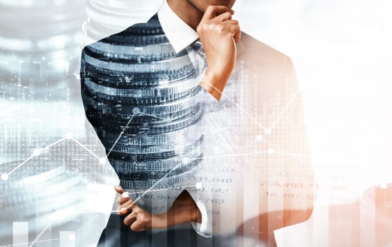 Businessman analyst working with digital finance business data graph showing technology of investment strategy for perceptive financial business decision. Digital economic analysis technology concept.