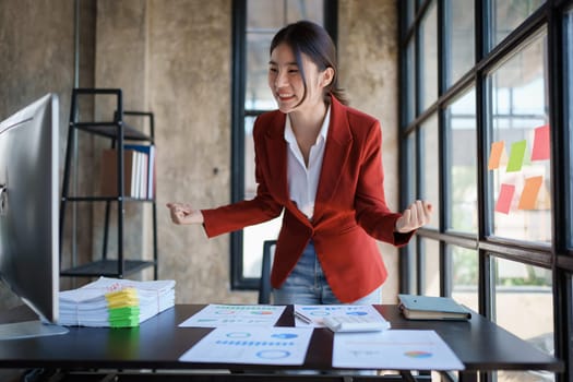 Portrait of a woman business owner showing a happy smiling face as he has successfully