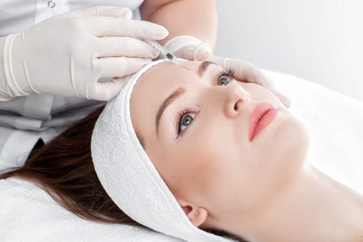 woman getting injection. beauty injections and cosmetology