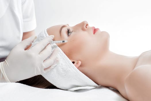 woman getting injection. beauty injections and cosmetology