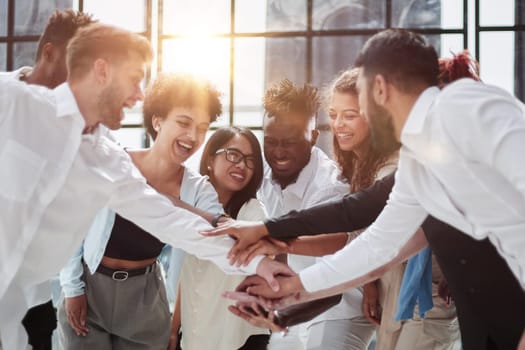 Teamwork and team spirit ,handshake in a group after work succe