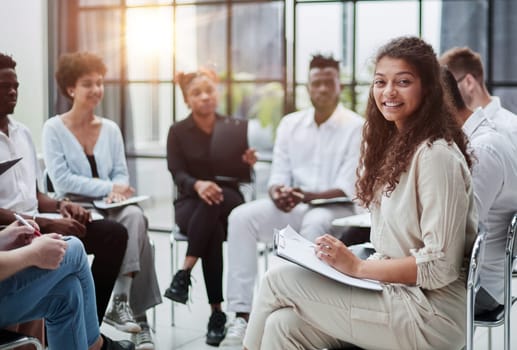 Male mentor executive leader talking during briefing, multi-ethnic workers engaged