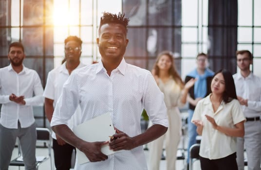 Happy business people applauding a good presentation