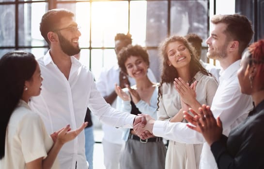 Business people shaking hands, finishing up a meeting