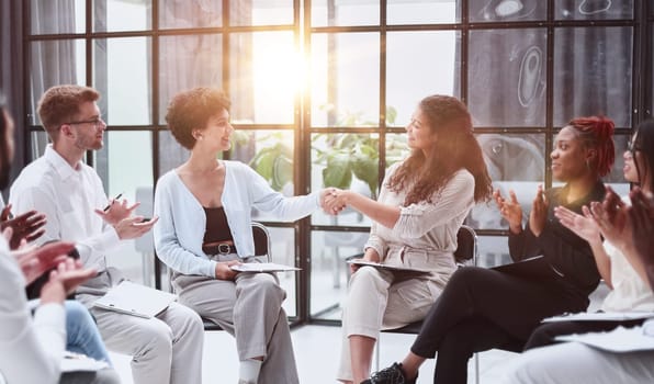 two businessman shake hand with partner to celebration partnership and business deal concept