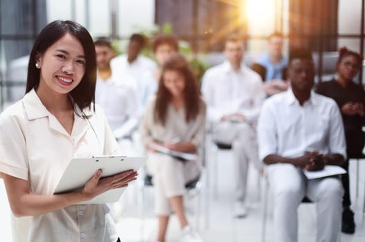 Business people attending a seminar with social distancing