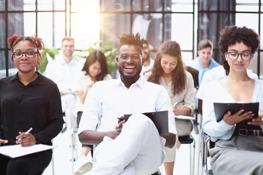 Group of multi-ethnic business people in a seminar
