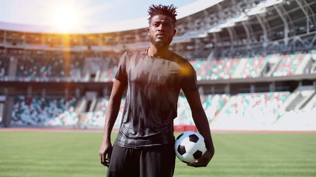 African American soccer player during match inside large stadium