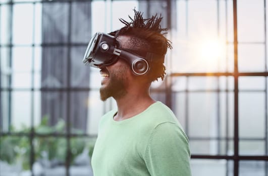 A man is looking for bright impressions using gadgets.