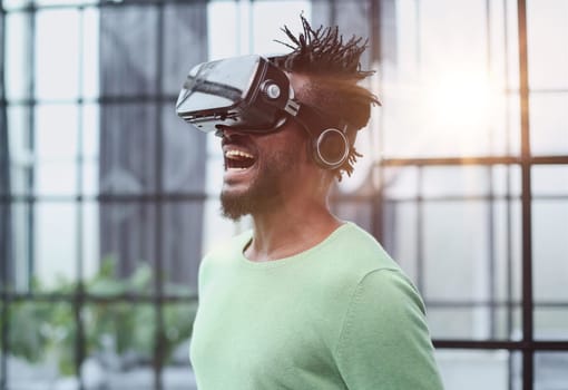 A man is looking for bright impressions using gadgets.