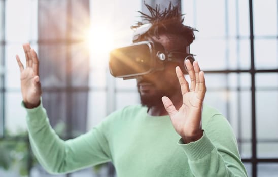 A man is looking for bright impressions using gadgets.