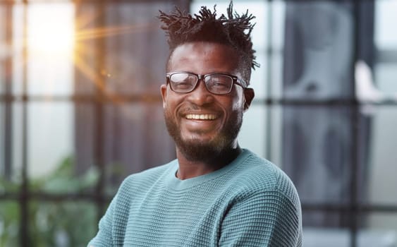 Thoughtful young black man looking straight ahead