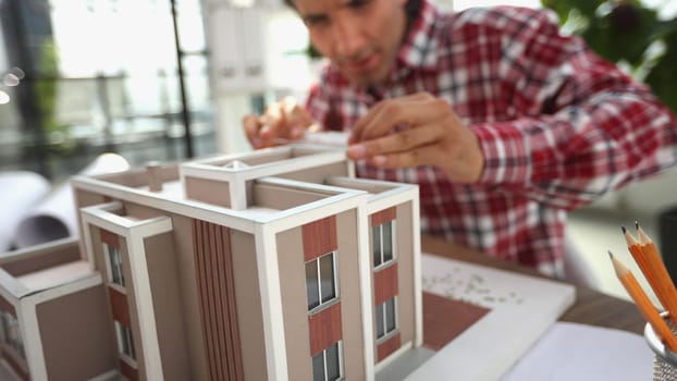 Architecture design drawings, building model on blueprint floor plan, house construction. 3d