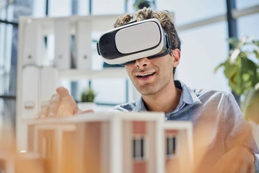 looks at the layout of the apartment in virtual reality glasses.
