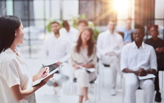 Business people attending a seminar with social distancing