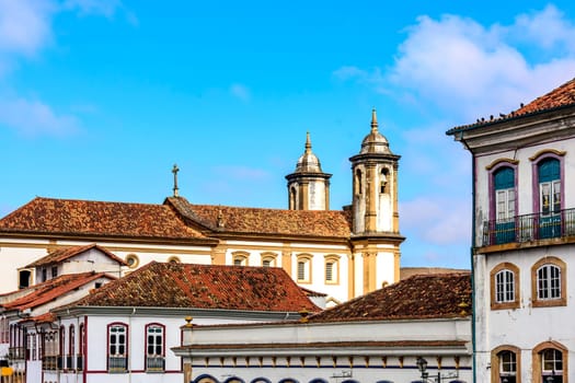 Roof, towers and windows of historic houses and churches in the city of Ouro Preto in Minas Gerais