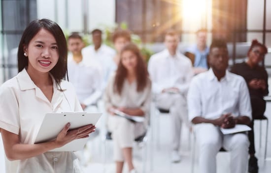 Business people attending a seminar with social distancing