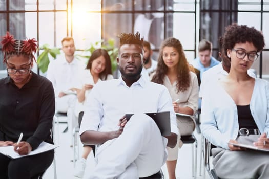 Group of multi-ethnic business people in a seminar