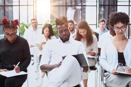 Group of multi-ethnic business people in a seminar