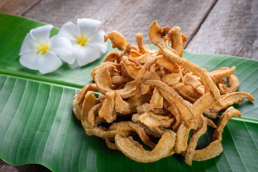 Pork snack on wood table