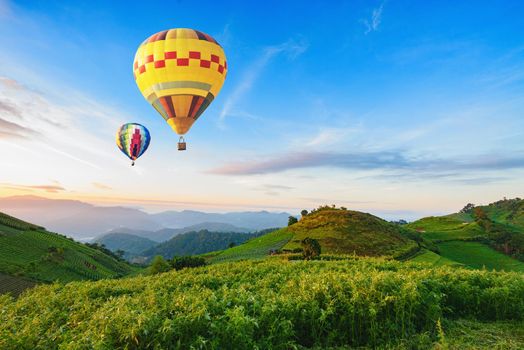 balloon over the mountain and sunrise