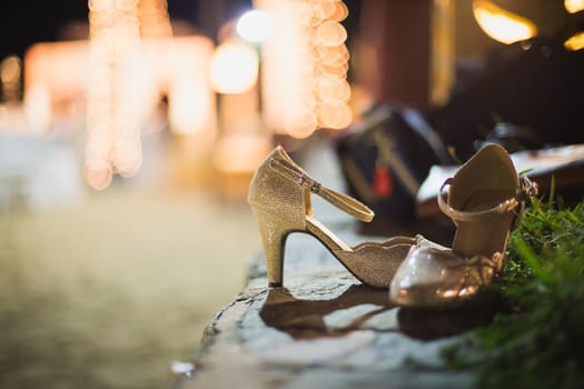 women shoe on night bokeh background