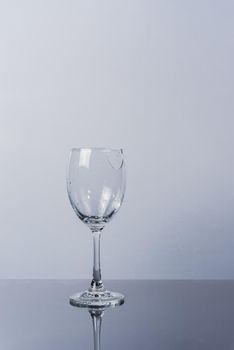 broken vine glass on white backgeound isolated