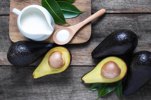 fresh organic avocado on old wooden table