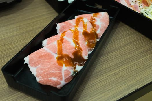 Raw beef slice for barbecue or Japanese style yakiniku