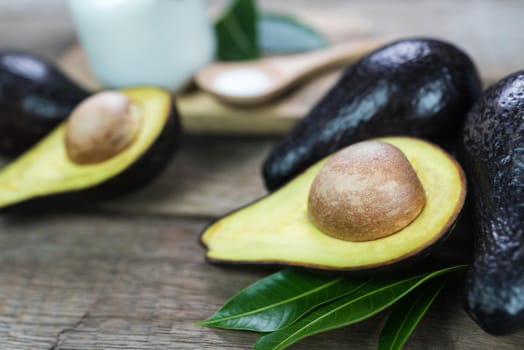 fresh organic avocado on old wooden table