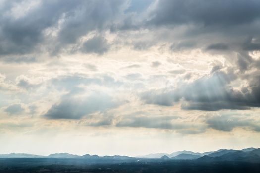 colorful sky with sun background in mountains. sunset