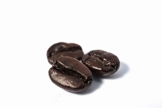 roasted coffee beans isolated in white background cutout