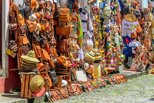 Traditional trade of typical products, souvenirs and gifts of various types in the streets and sidewalks of Pelourinho in the city of Salvador, Bahia