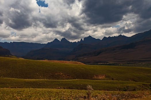 Storm clouds gather over Cathedral Peak. Drakensberg. South Africa