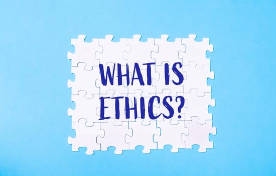 Phrase on white puzzles What is ethics. High quality photo