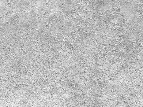 The texture of a gray concrete wall in close-up. Background for design with copy space.