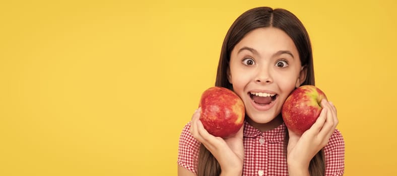 surprised kid hold healthy apple fruit with vitamin. Child girl portrait with apple, horizontal poster. Banner header with copy space