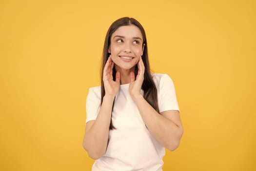 Happy smiling woman portrait. Attractive young pretty cheerful girl in casual clothing feeling happy and carefree, isolated background