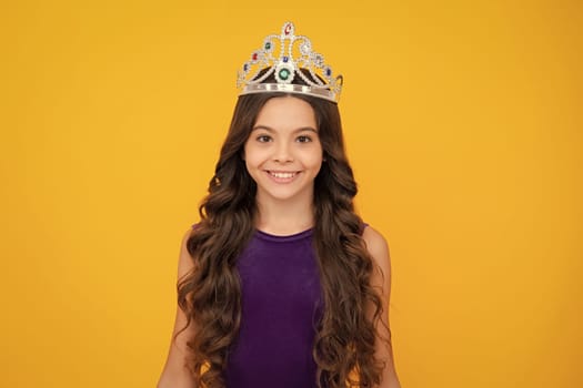 Girls birthday party, funny kid in crown. Imagine herself a queen, child wear diadem. Successful teenager wear luxury beauty queen crown, success. Happy girl face, positive and smiling emotions