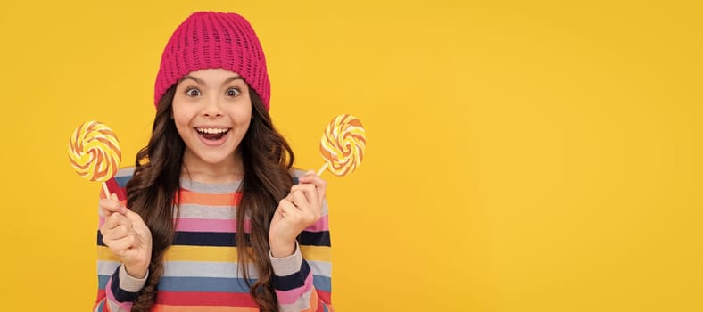 surprised teen girl with lollipop candy, happiness.