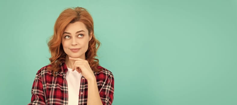 thinking redhead woman with curly hair in checkered casual shirt, thoughtful. Woman isolated face portrait, banner with mock up copyspace