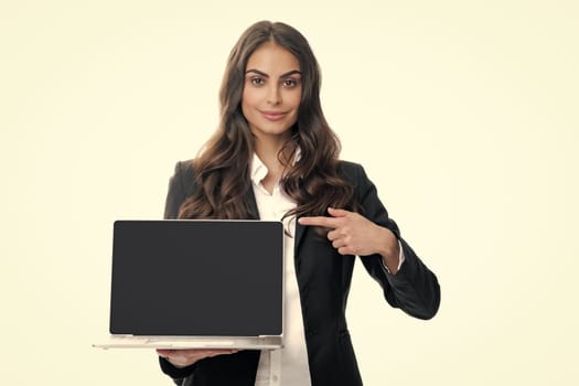 Woman holding laptop with empty mock up screen for copy space. Portrait of college student with laptop. Woman working on laptop, freelance