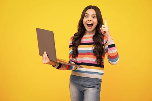 Amazed teenager. Back to school, Teenager school girl with laptop computer. Excited teen schoolgirl