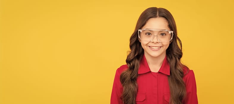 happy teenager girl improve eyesight in protective glasses. Child builder with protective glasses horizontal poster design. Banner header, copy space