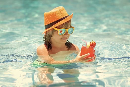 Kid boy drink cocktail in swim pool. Active healthy lifestyle, swim water sport activity on summer vacation with child