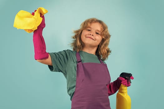 Portrait of child cleaning, concept growth, development, family relationships. Housekeeping and home cleaning concept. Child use duster and gloves for cleaning. Studio isolated background