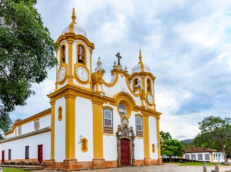 Baroque church facade with its towers in downtown of the historic city of Tiradentes in Minas Gerais