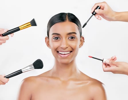 Portrait, beauty and woman with makeup, brushes or organic facial on a white studio background. Face, female person or model with cosmetics tool, self care or wellness with natural skincare or luxury.