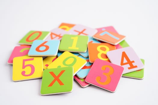 Number wood block cubes for learning Mathematic, education math concept.